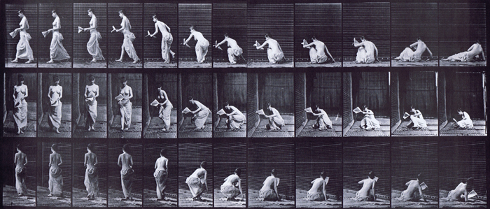 Profile, front, and rear three-quarter view of semi nude female wearing cloth skirt, arising from the ground with paper in left hand animation reference using muybridge plate 271 from animal locomotion