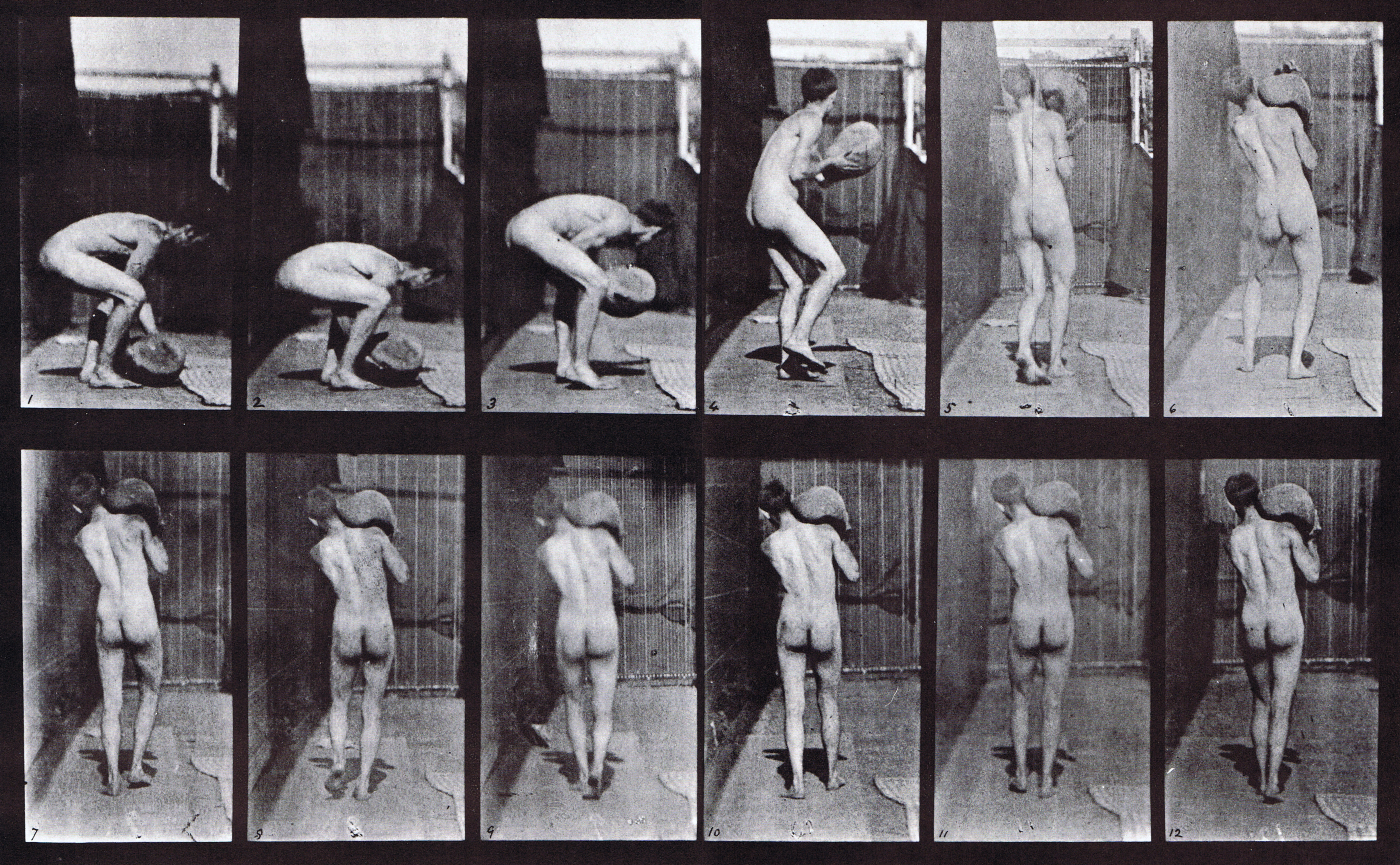large rear view of nude male lifting a 75 pound stone on shoulder animation reference using muybridge plate 397 from animal locomotion